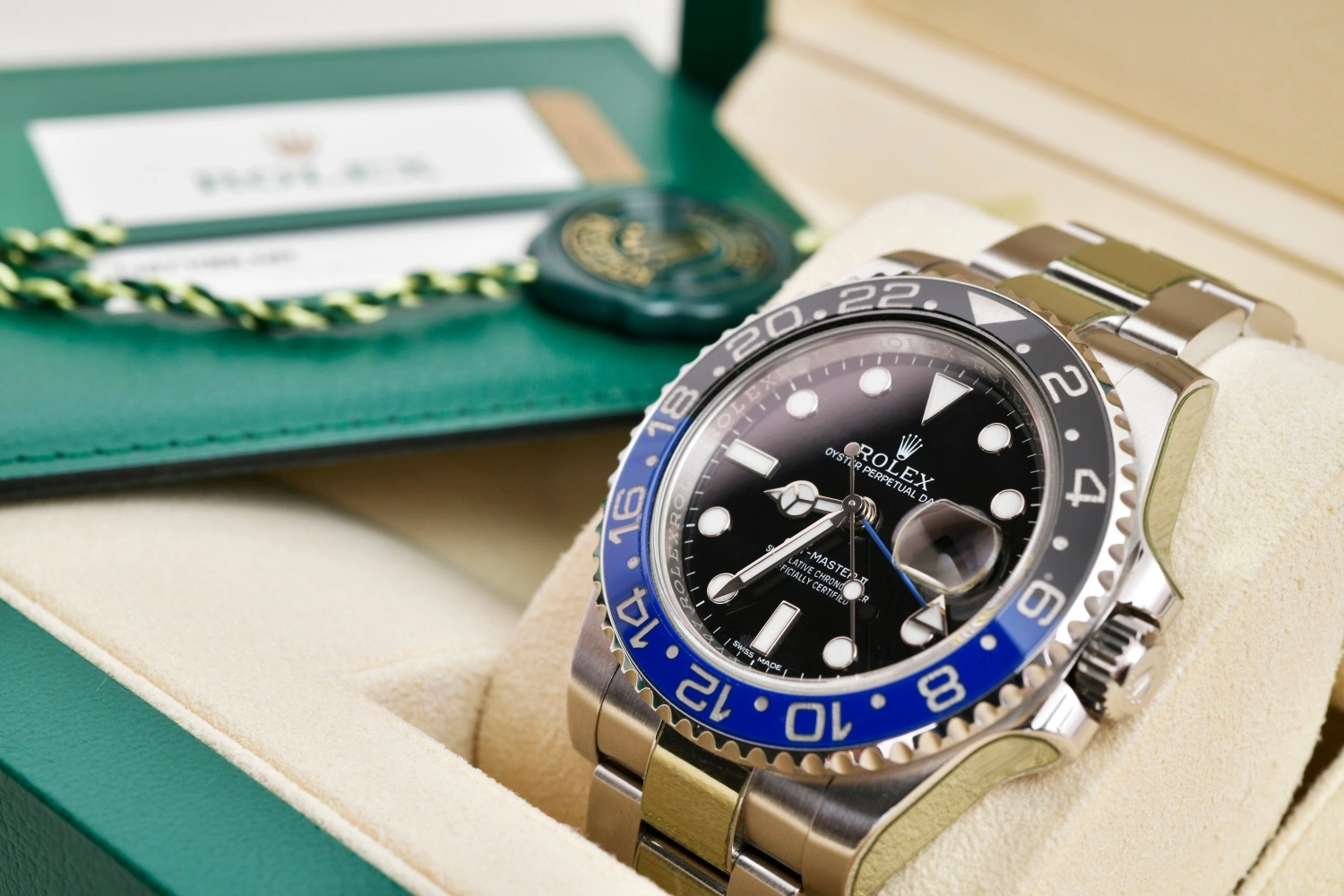 Rolex GMT-Master II Batman watch with box and papers, highlighting documentation value in luxury watch loans.