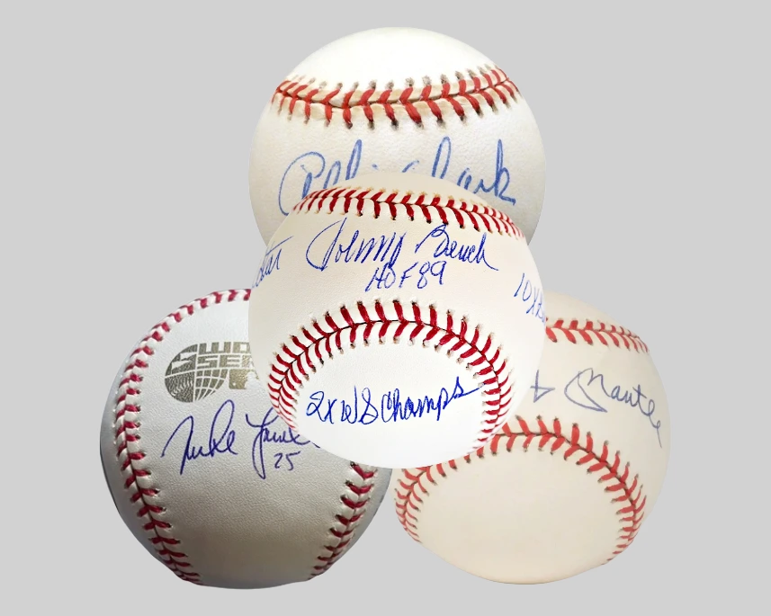Authenticated signed baseballs featuring autographs from Hall of Fame players and MLB legends, representing the type of high-value sports memorabilia accepted for collateral loans at Qollateral.