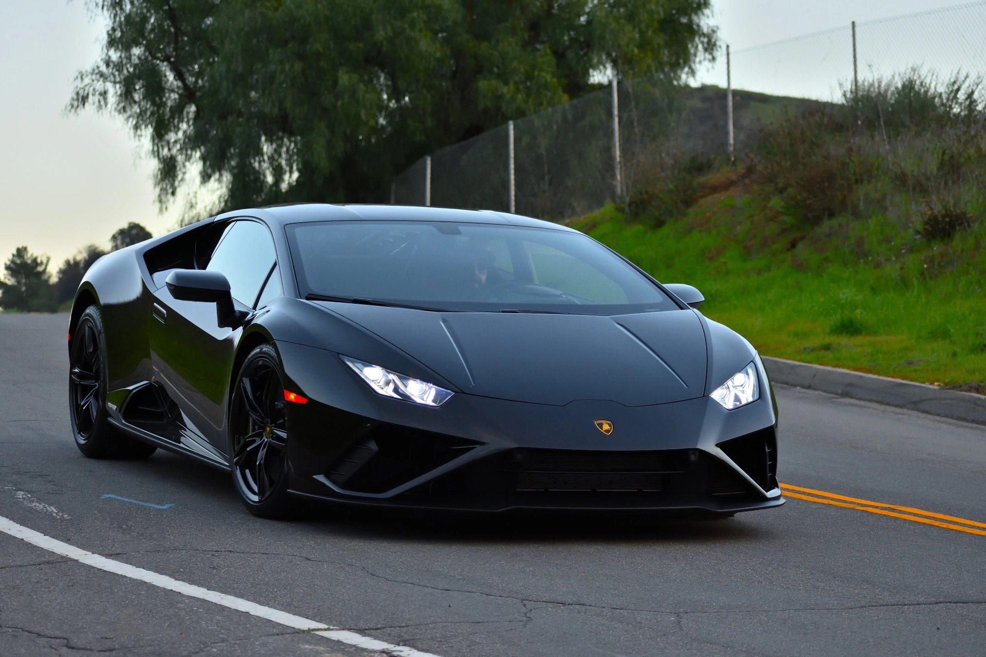 Black Lamborghini Huracán illustrating luxury car depreciation and resale value