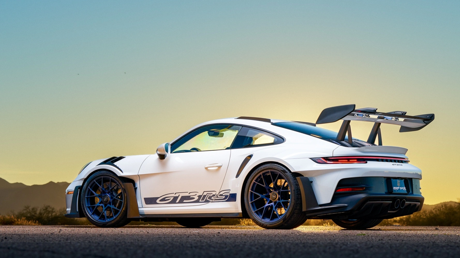 White Porsche 911 GT3 RS representing a luxury car collateral loan versus a title loan
