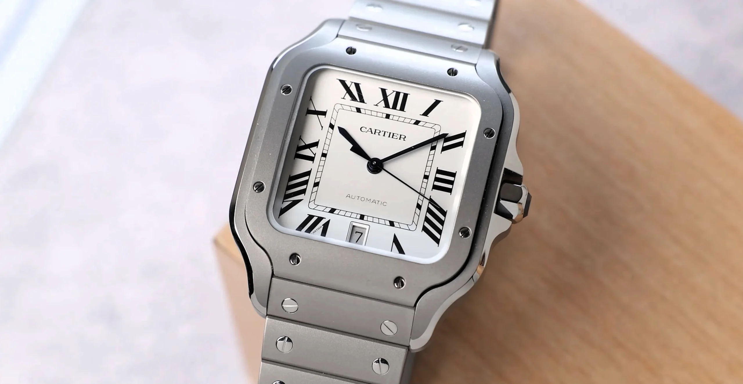 Cartier Santos with square dial, Roman numerals and stainless-steel bracelet