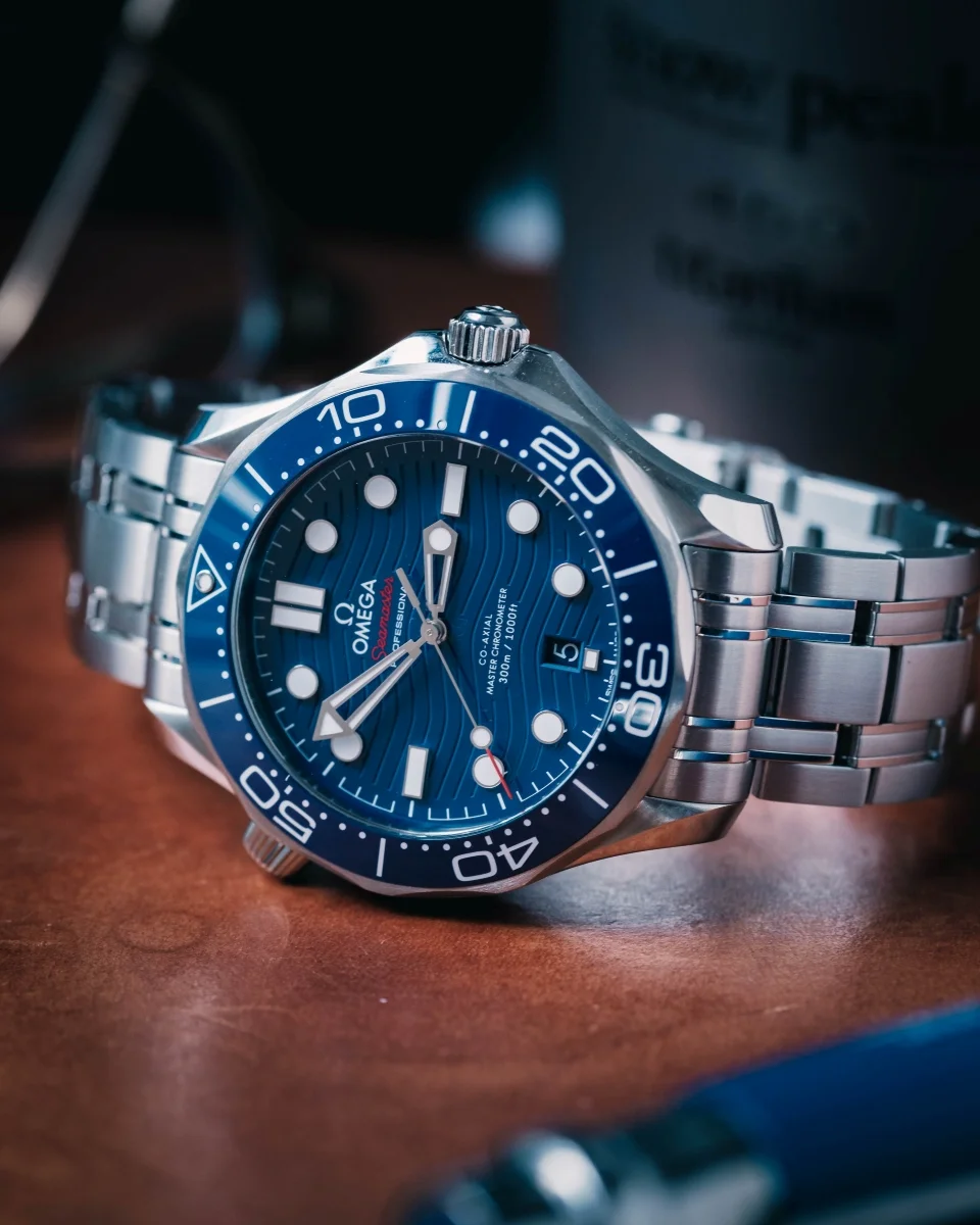 Blue Omega Seamaster Professional dive watch with wave dial and rotating bezel