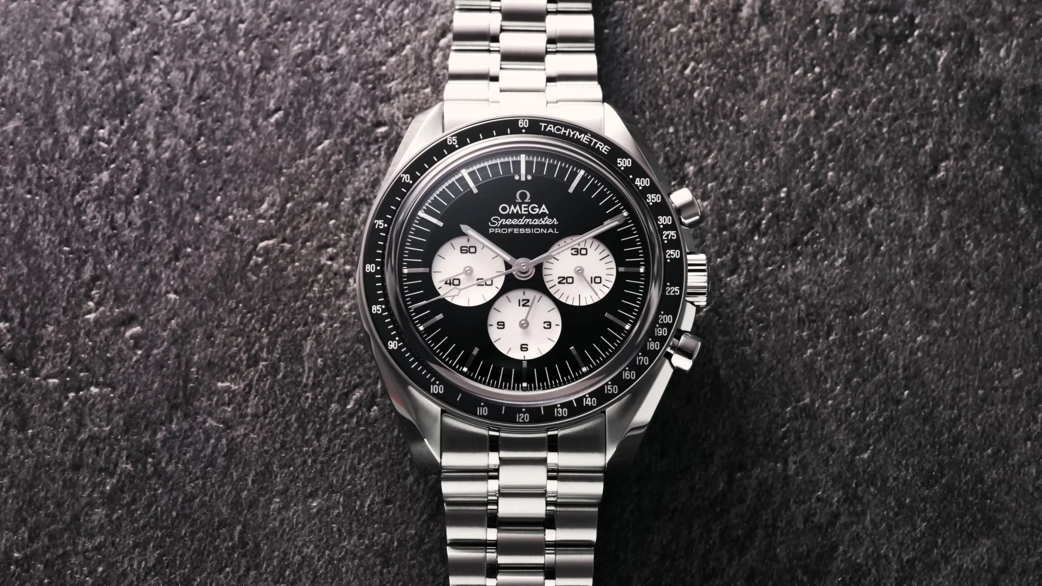 Omega Speedmaster chronograph representing the iconic Moonwatch collection